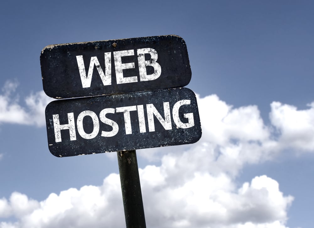 Web Hosting sign with clouds and sky background